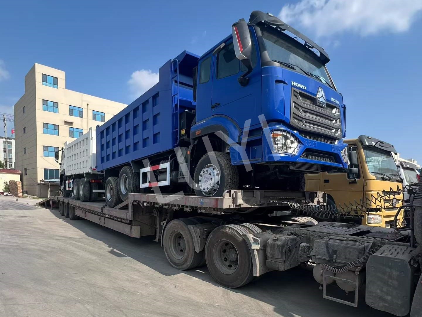 Two HOWO NX Dump Trucks Shipped to Sudan for Local Infrastructure